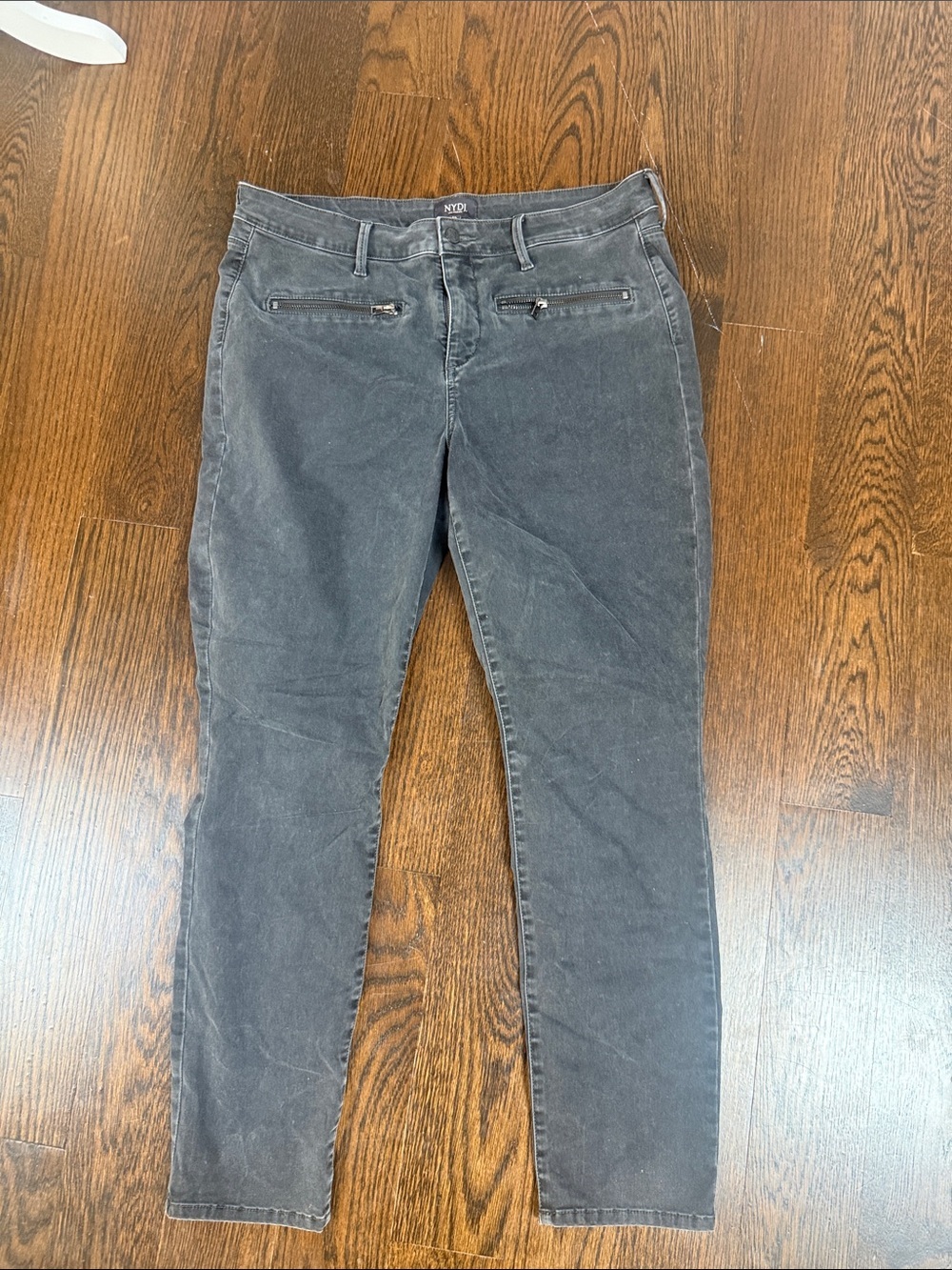 NYDJ skinny jeans feature unique front zipper pockets size 12